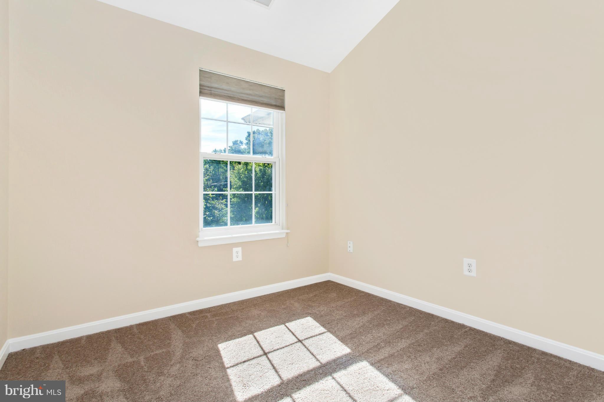 11006 Hemingway Court Silver Spring, MD 20902 - Photo 20 of 30 an empty room with a window
