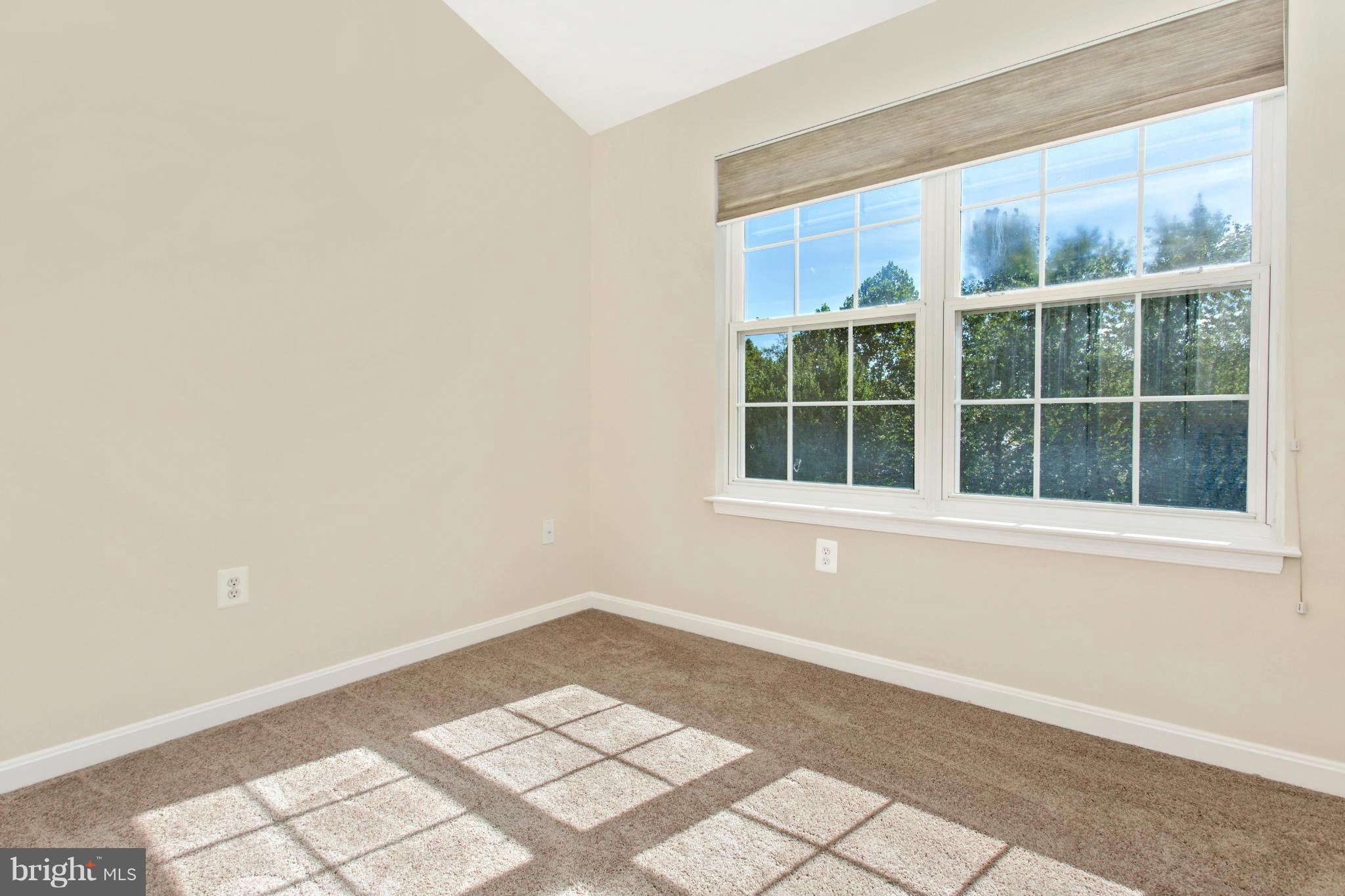 11006 Hemingway Court Silver Spring, MD 20902 - Photo 22 of 30 a view of an empty room with a window