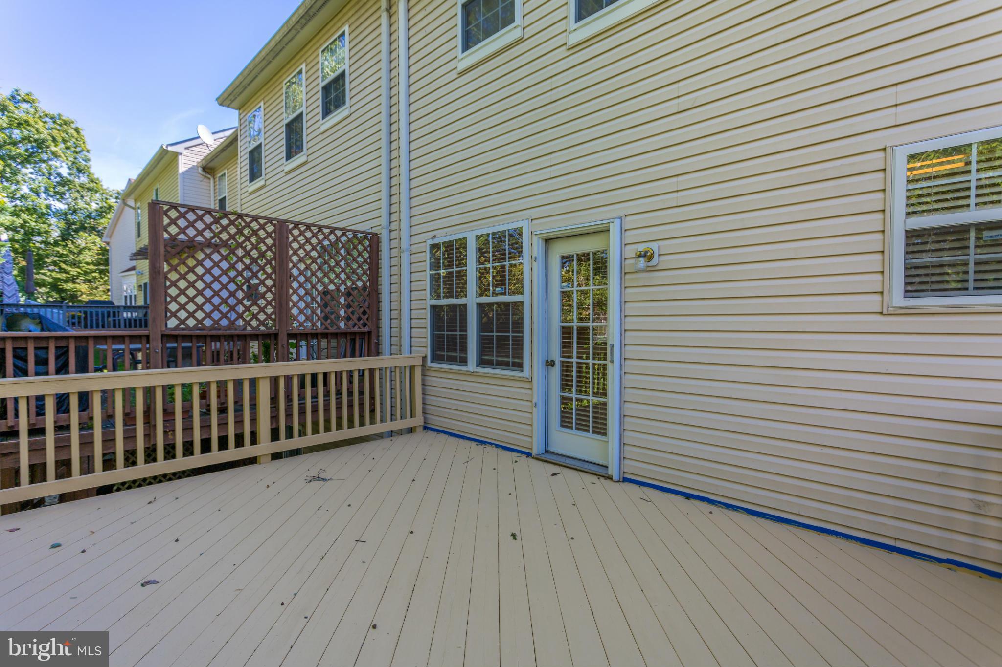 11006 Hemingway Court Silver Spring, MD 20902 - Photo 28 of 30 a porch with wooden floor