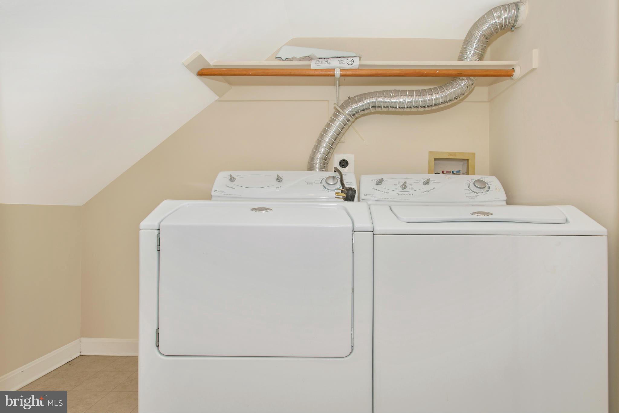 11006 Hemingway Court Silver Spring, MD 20902 - Photo 5 of 30 a utility room with dryer and washer