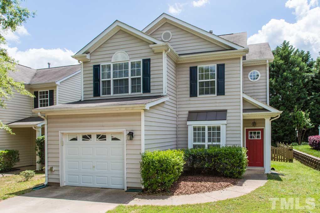 8419 Tie Stone Way Raleigh, NC 27613 - Photo 1 of 30 a view of a house with more windows and plants