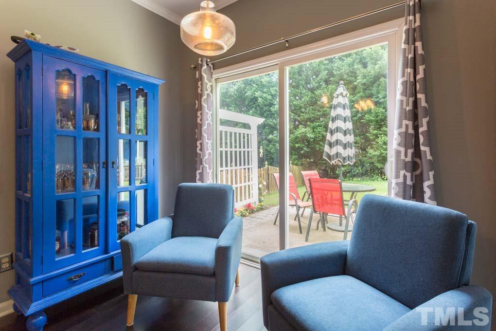 8419 Tie Stone Way Raleigh, NC 27613 - Photo 15 of 30 a living room with furniture and a large window