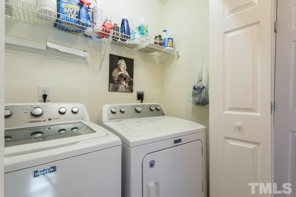 8419 Tie Stone Way Raleigh, NC 27613 - Photo 24 of 30 a utility room with dryer and washer