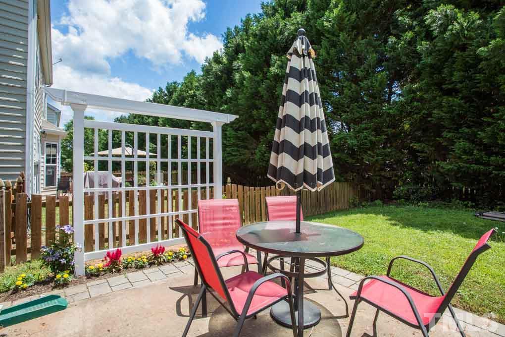 8419 Tie Stone Way Raleigh, NC 27613 - Photo 26 of 30 a balcony with table and chairs