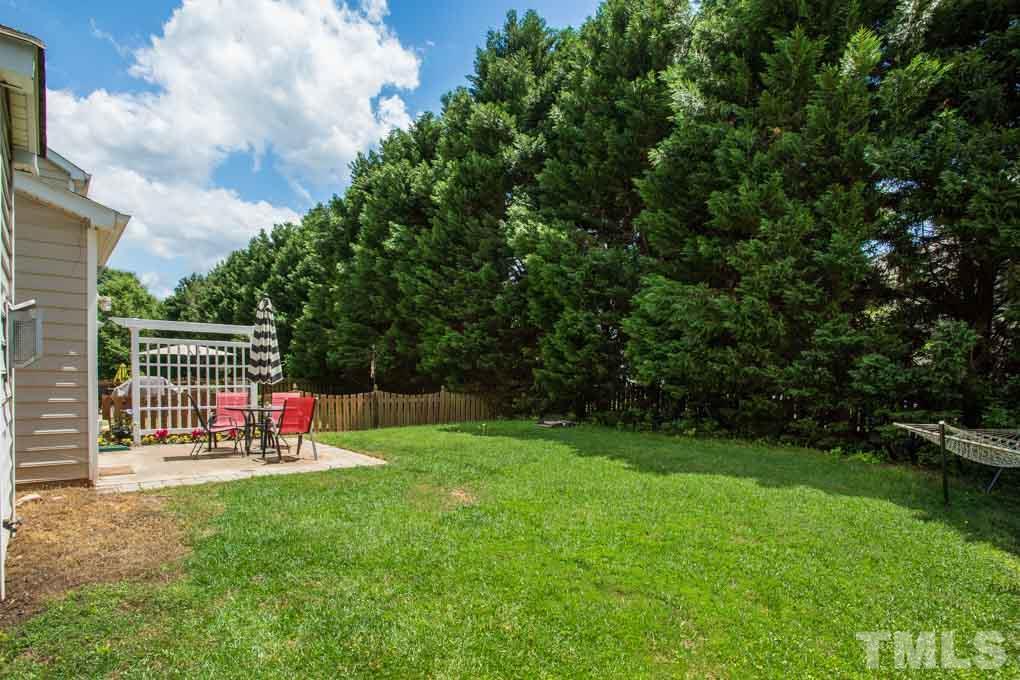 8419 Tie Stone Way Raleigh, NC 27613 - Photo 27 of 30 a view of a park with iron fence