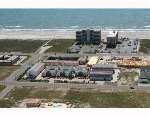 a aerial view of a house with a ocean view