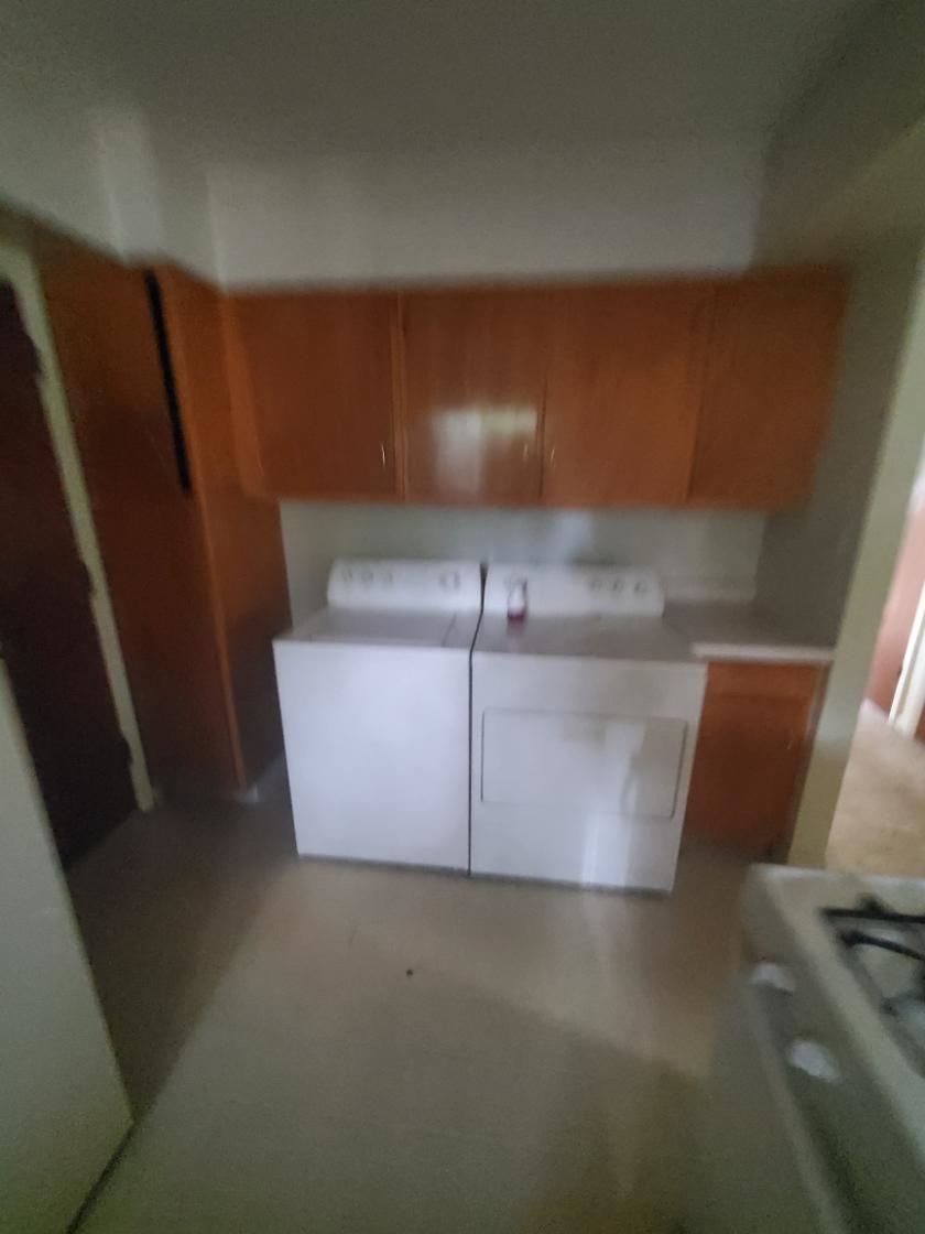 1486 Winter Drive Freeport, IL 61032 - Photo 14 of 20 a room with water heater and racks