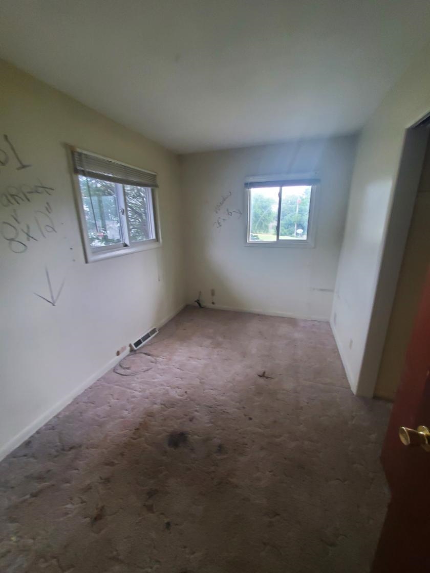 1486 Winter Drive Freeport, IL 61032 - Photo 19 of 20 an empty room with windows