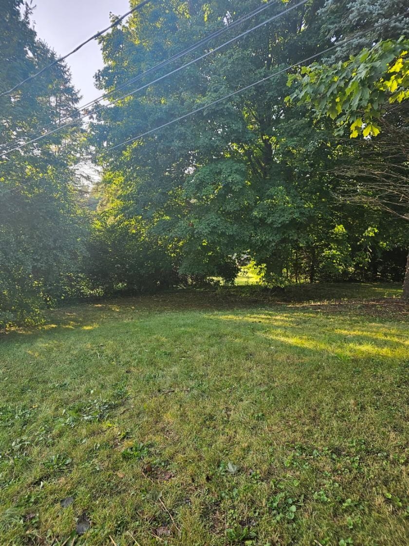 1486 Winter Drive Freeport, IL 61032 - Photo 20 of 20 a view of outdoor space with deck and yard
