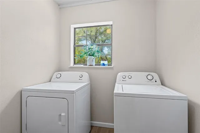 a utility room with dryer and washer