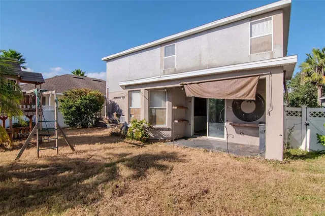 a view of a house with a patio