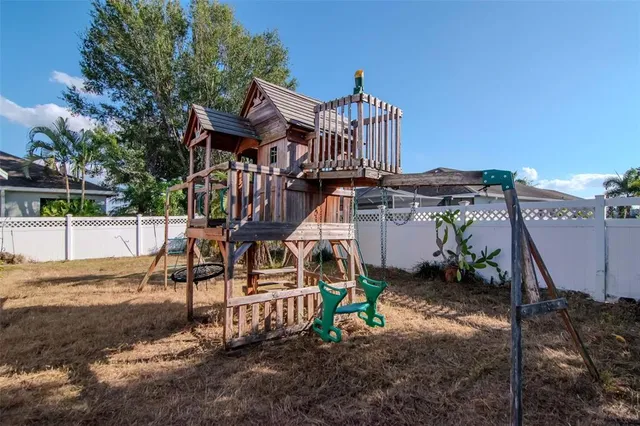 a view of a house with a park
