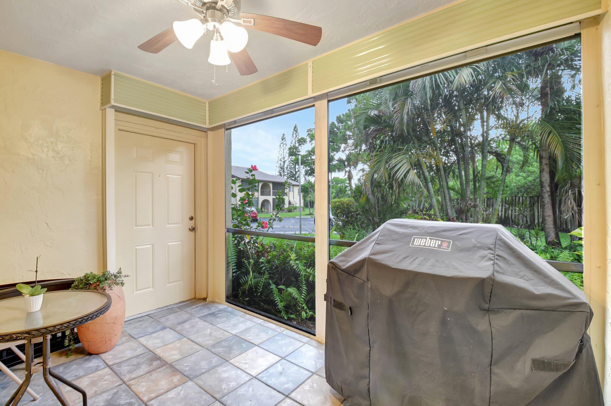323 Pine Ridge Circle, Unit A1 Greenacres, FL 33463 - Photo 5 of 40 a outdoor space with furniture