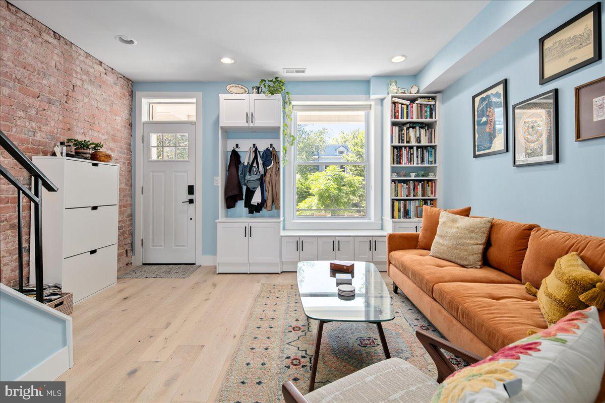 1618 G Street Southeast Washington, DC 20003 - Photo 14 of 53 a living room with furniture and a window