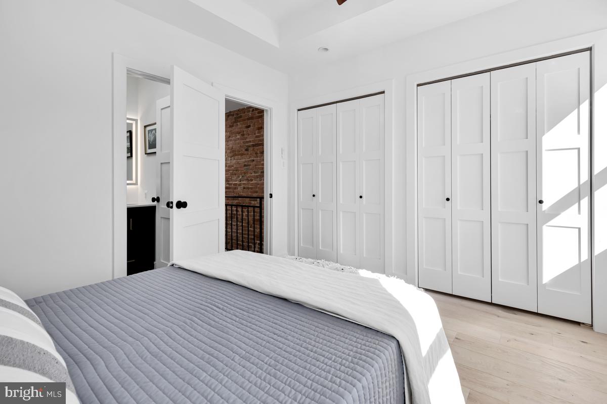 1618 G Street Southeast Washington, DC 20003 - Photo 37 of 53 a bedroom with a bed and a window