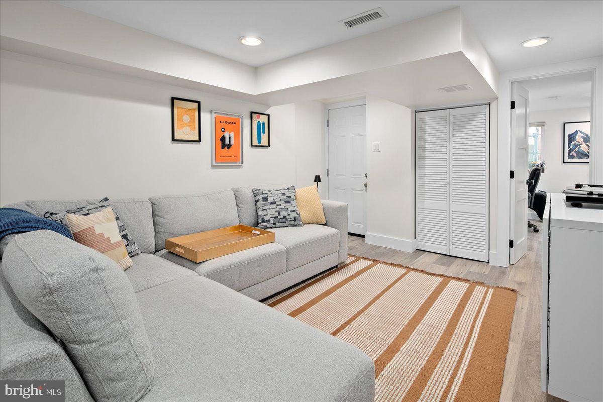 1618 G Street Southeast Washington, DC 20003 - Photo 47 of 53 a bedroom with a bed and a painting on the wall