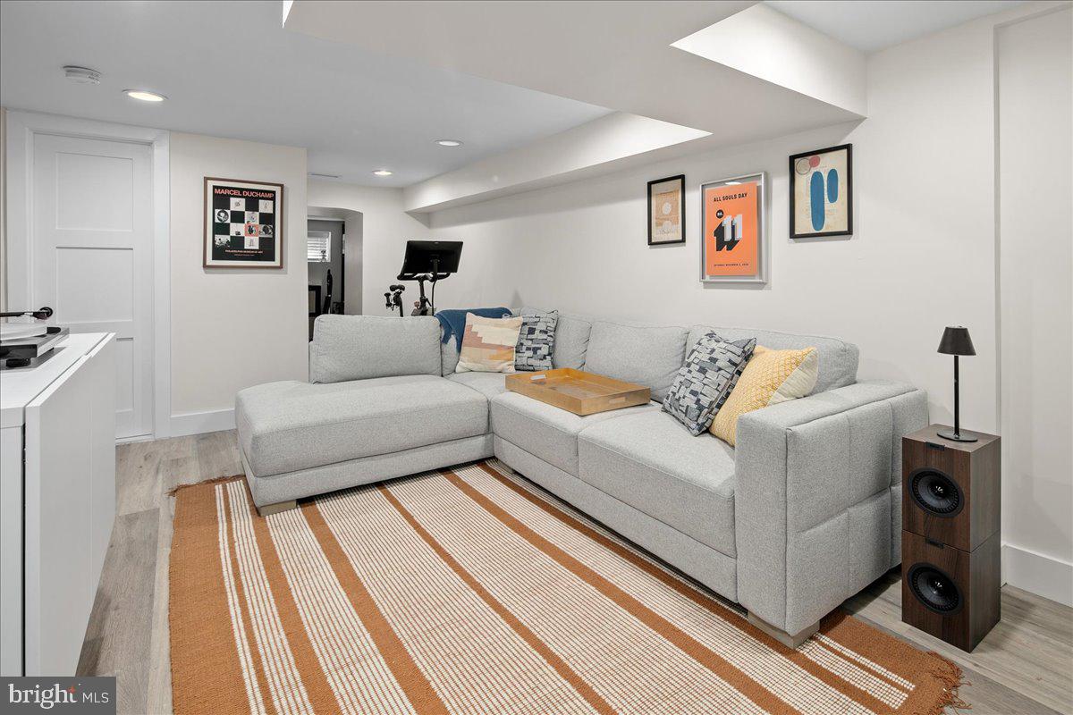 1618 G Street Southeast Washington, DC 20003 - Photo 50 of 53 a living room with furniture and a rug