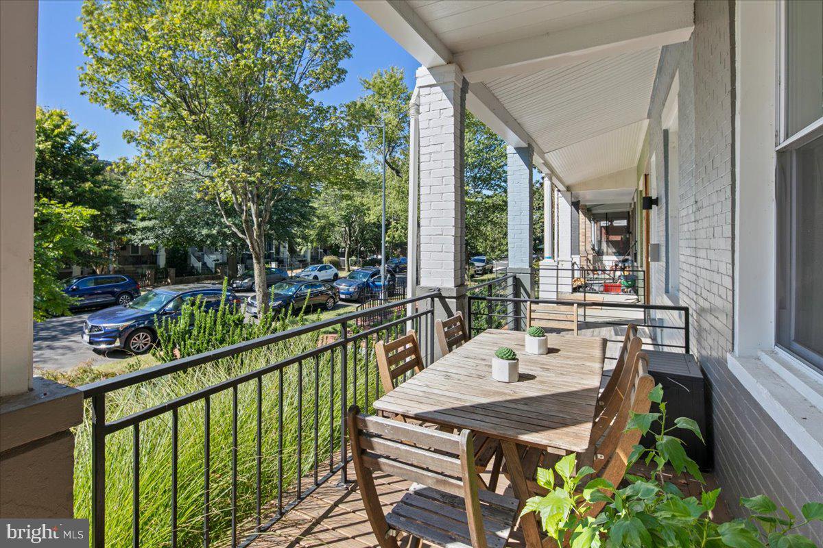 1618 G Street Southeast Washington, DC 20003 - Photo 7 of 53 a balcony with furniture and a potted plant