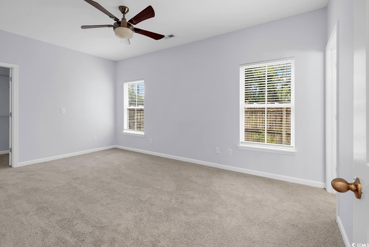 1636 Stuart Square Circle Myrtle Beach, SC 29577 - Photo 14 of 28 Carpeted spare room with ceiling fan and baseboards