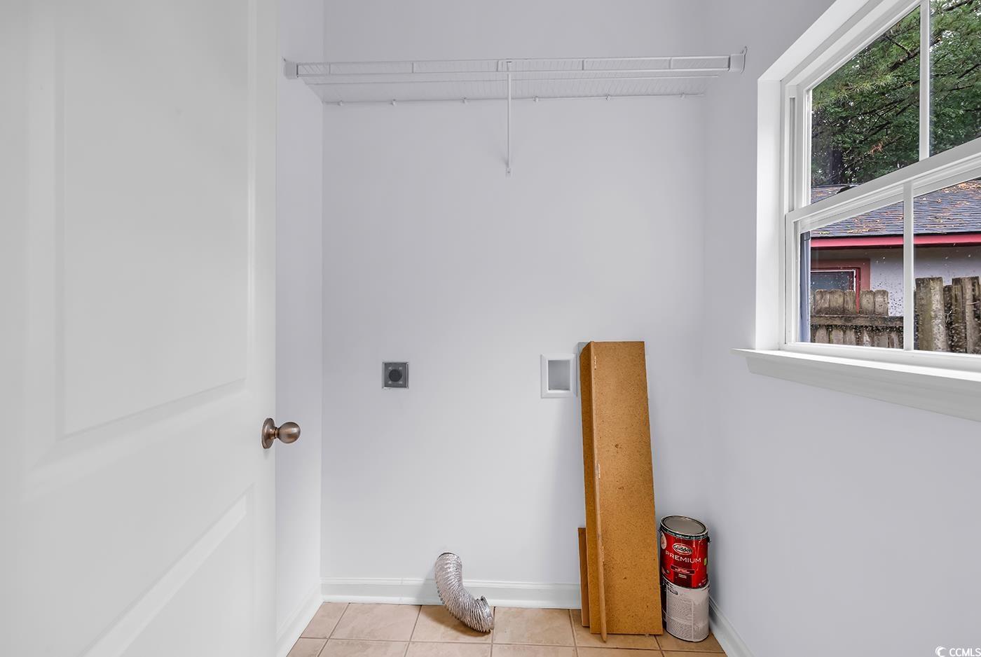 1636 Stuart Square Circle Myrtle Beach, SC 29577 - Photo 25 of 28 Laundry room featuring electric dryer hookup and light tile patterned floors