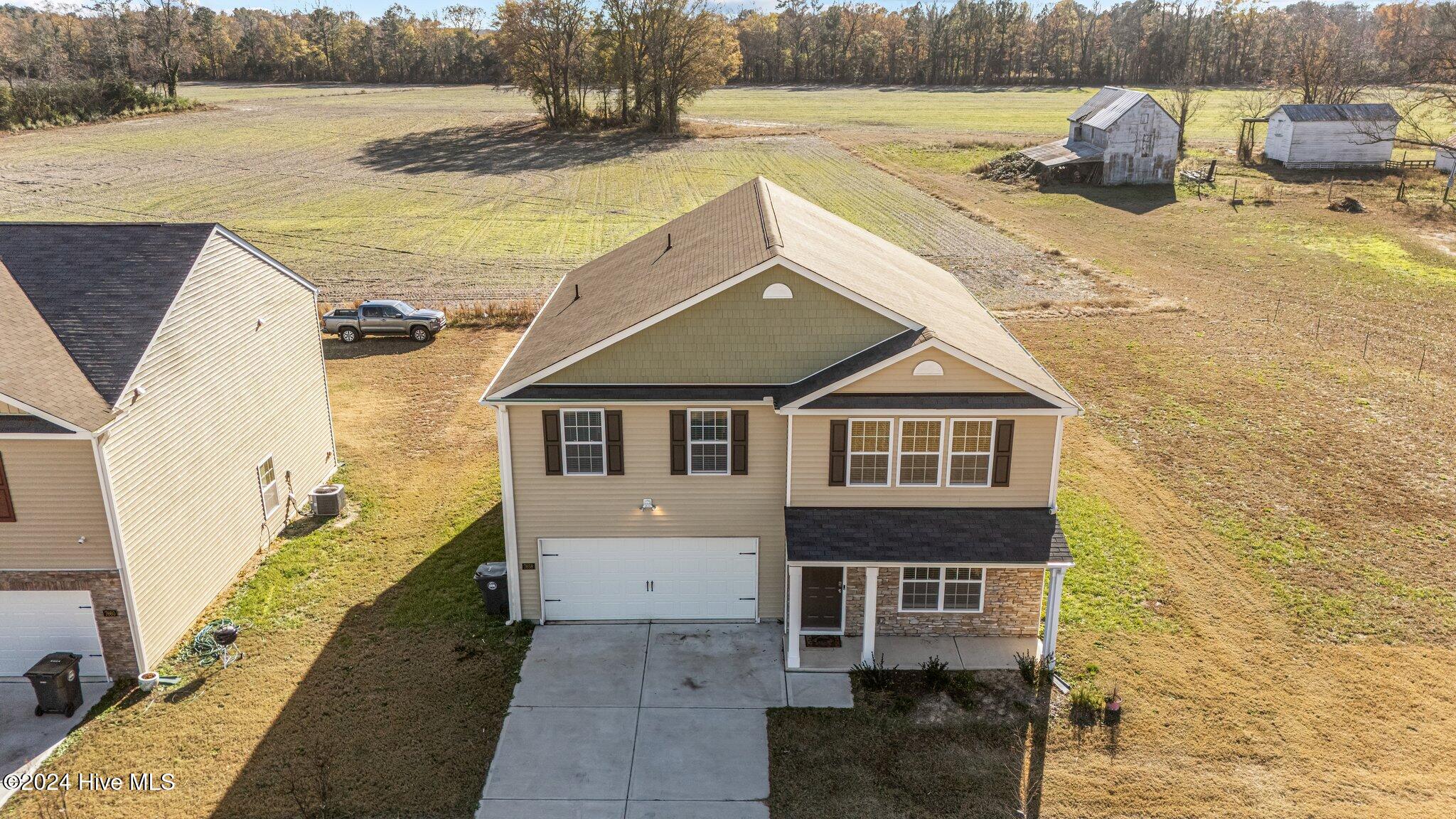 7658 Sand Pit Road Stantonsburg, NC 27883 - Photo 5 of 53 39-web-or-mls-DJI_20241206135612_0120_D