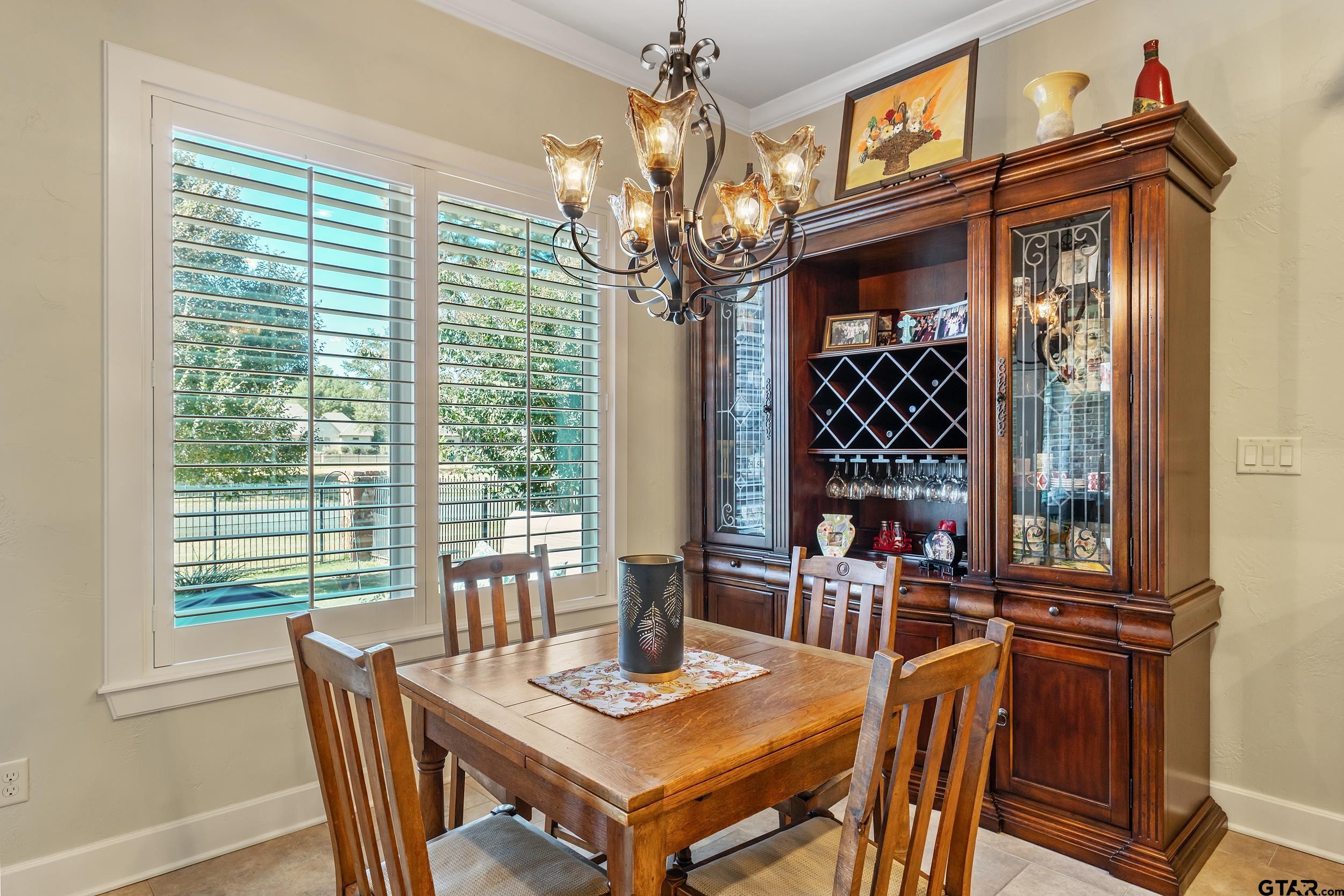 7311 Cross Road Tyler, TX 75703 - Photo 16 of 36 a view of a dining room with furniture window and outside view