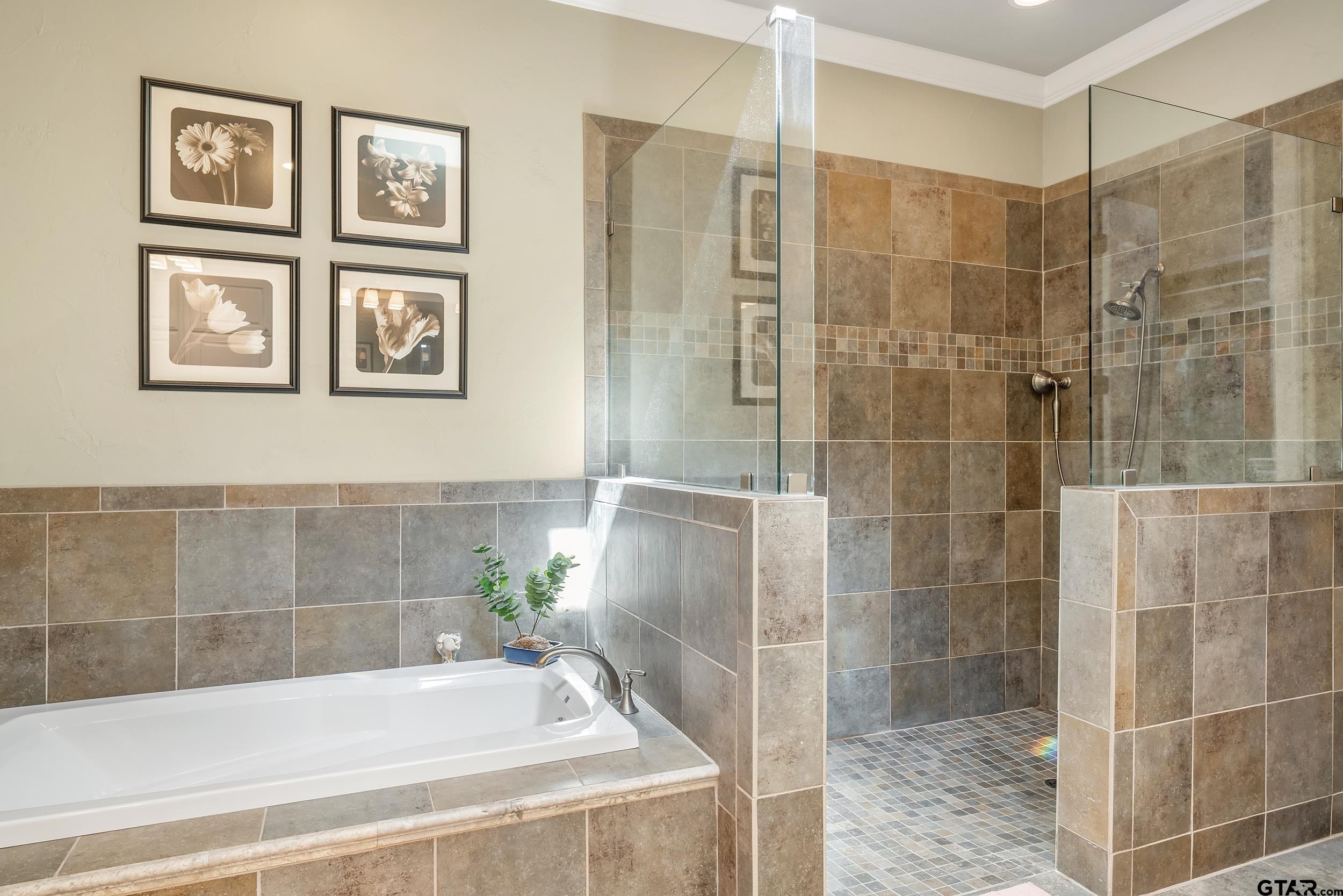 7311 Cross Road Tyler, TX 75703 - Photo 22 of 36 a white bath tub sitting next to a shower