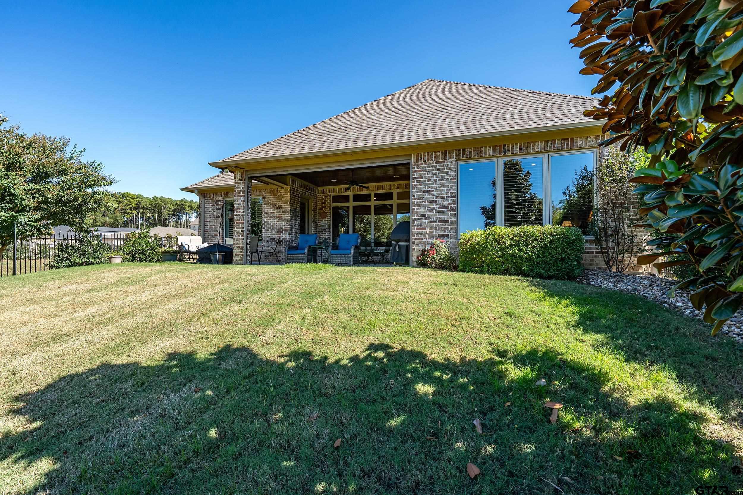 7311 Cross Road Tyler, TX 75703 - Photo 35 of 36 a view of a house with a yard