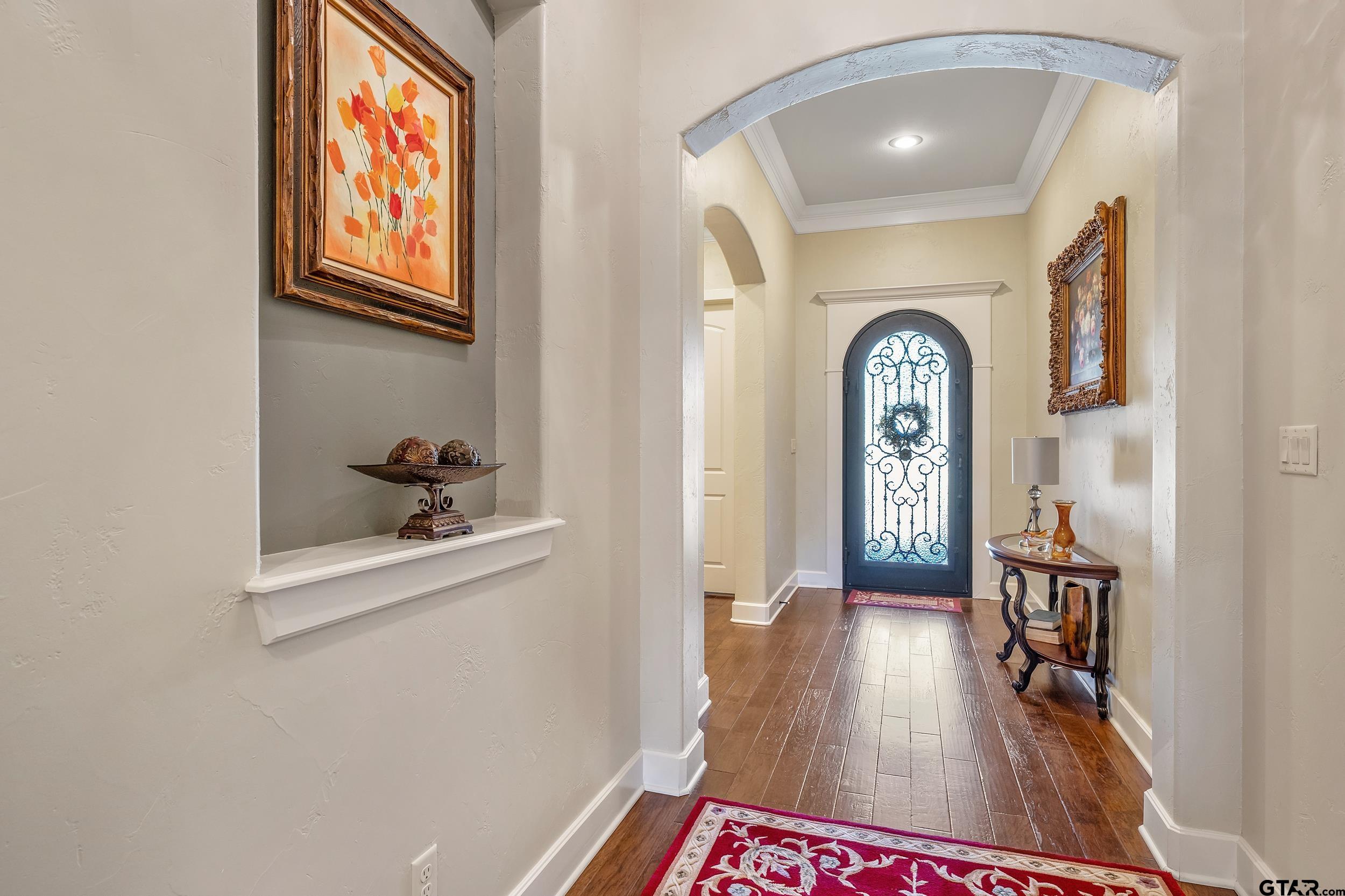7311 Cross Road Tyler, TX 75703 - Photo 5 of 36 a view of an entryway with wooden floor