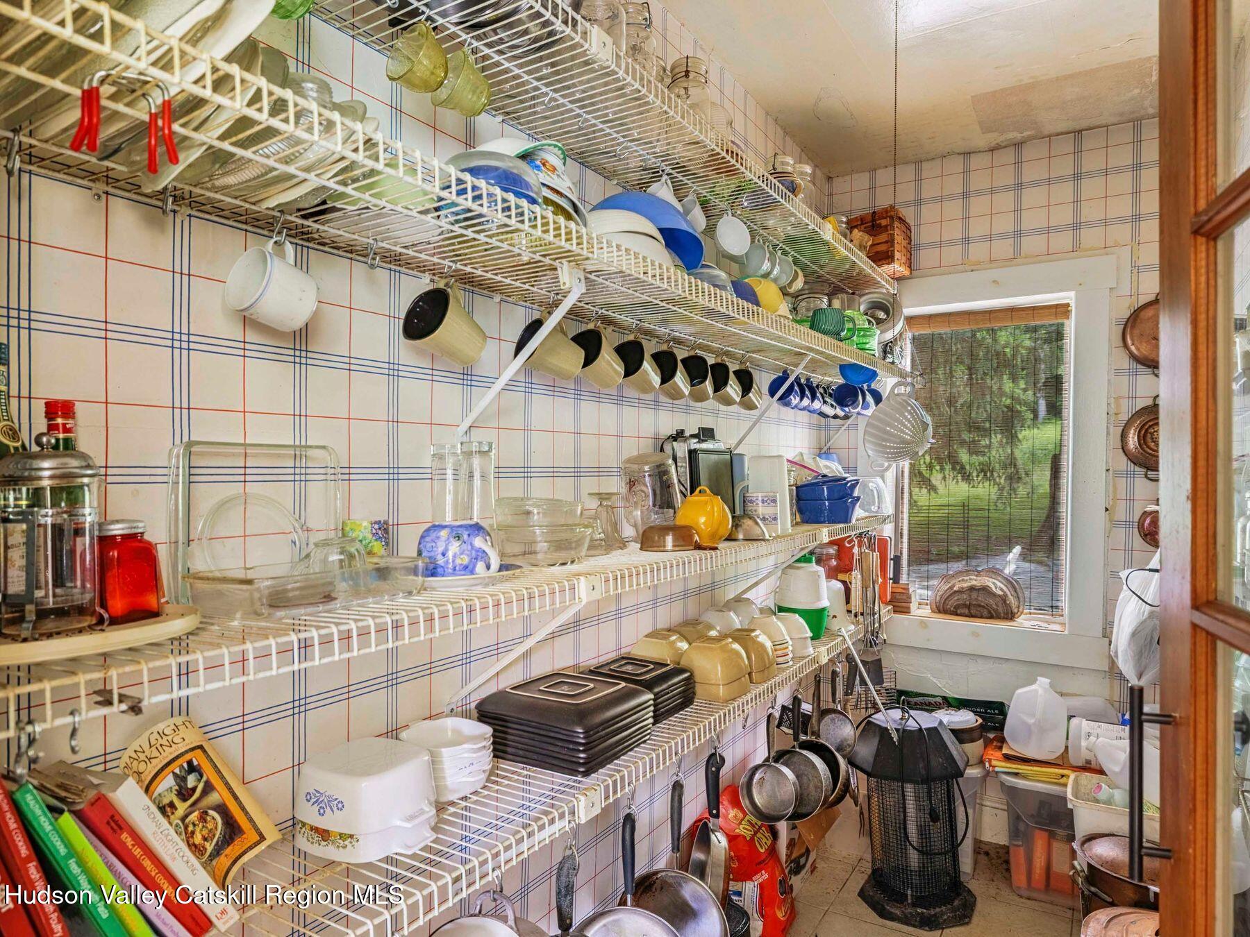 324 Schrader Road Ashland, NY 12468 - Photo 14 of 49 a cabinet and a table in a room