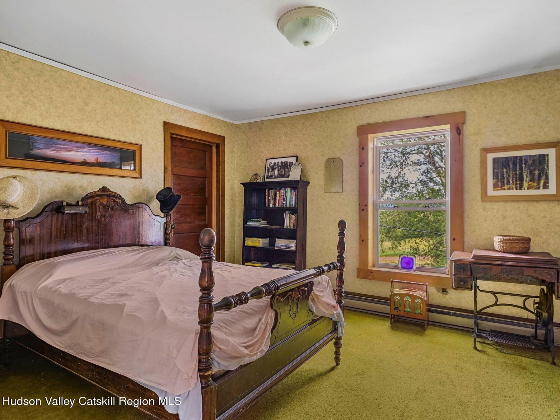 324 Schrader Road Ashland, NY 12468 - Photo 26 of 49 a bed room with furniture and a window