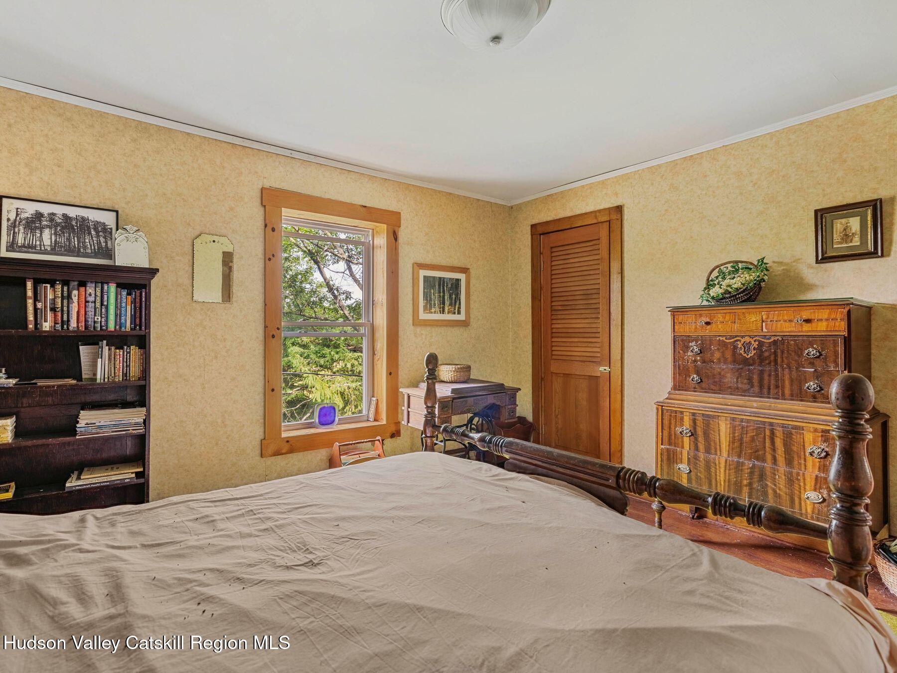 324 Schrader Road Ashland, NY 12468 - Photo 28 of 49 a bedroom with furniture and a window
