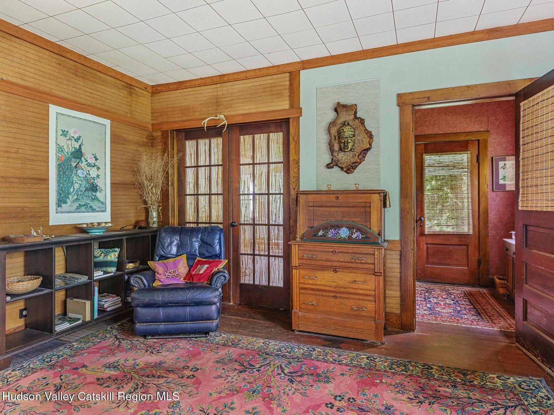 324 Schrader Road Ashland, NY 12468 - Photo 7 of 49 a room with furniture a rug and a window