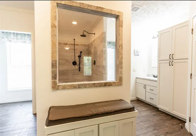 a bathroom with a bathtub and a sink