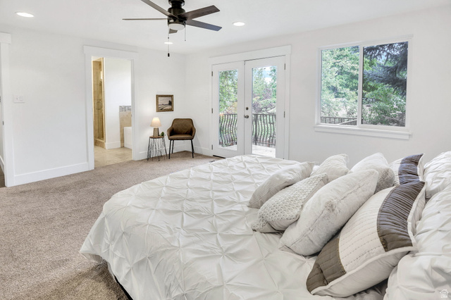 1320 Canyon Park Road Bountiful, UT 84010 - Photo 12 of 28 Carpeted bedroom featuring a double-pane window, ceiling fan, recessed lighting, and white French doors opening to an exterior deck