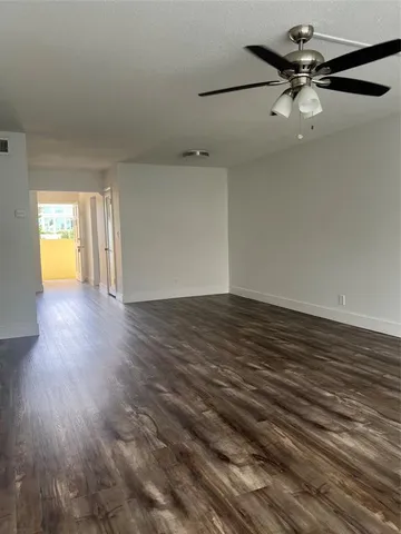 a view of an empty room and window