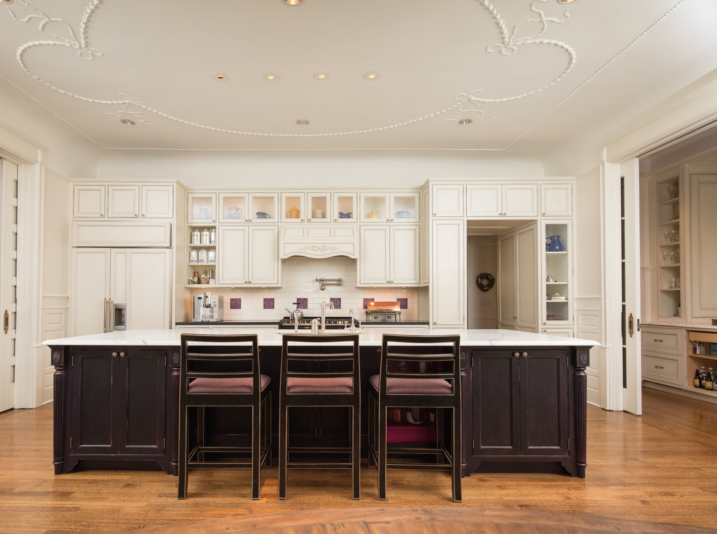 632 West Deming Place Chicago, IL 60614 - Photo 11 of 49 a room with stainless steel appliances kitchen island granite countertop a table chairs sink and cabinets
