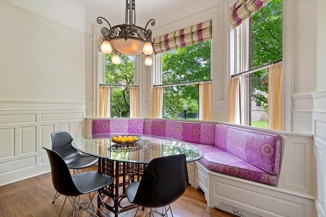 632 West Deming Place Chicago, IL 60614 - Photo 14 of 49 a view of a dining room with furniture a chandelier and wooden floor