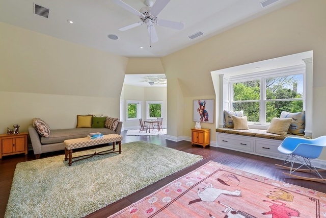632 West Deming Place Chicago, IL 60614 - Photo 33 of 49 a living room with furniture and a rug