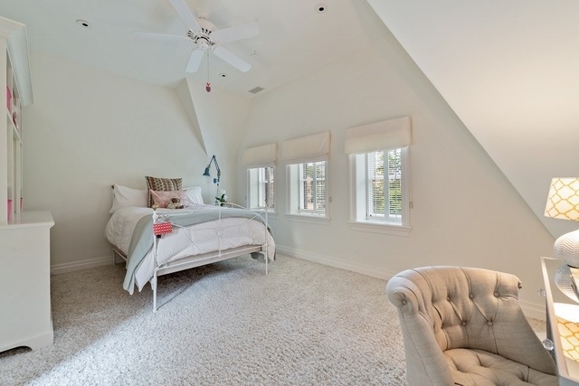 632 West Deming Place Chicago, IL 60614 - Photo 37 of 49 a bed room with a bed and a couch