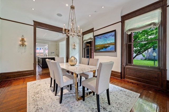632 West Deming Place Chicago, IL 60614 - Photo 8 of 49 a view of a dining room with furniture window and wooden floor