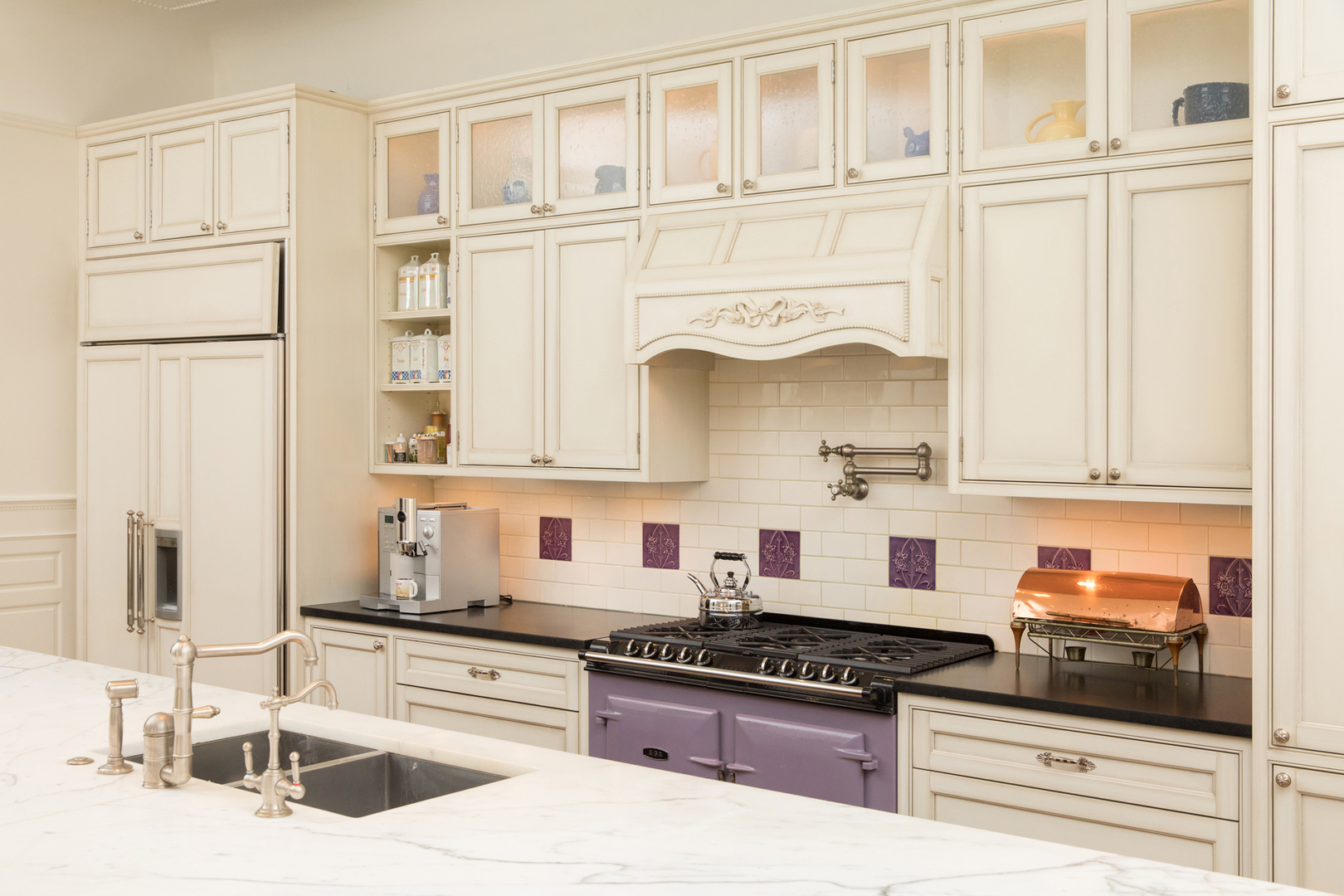 632 West Deming Place Chicago, IL 60614 - Photo 10 of 49 a kitchen with stainless steel appliances granite countertop a sink and a stove