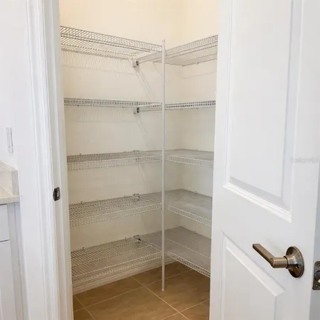 a room with walk in closet