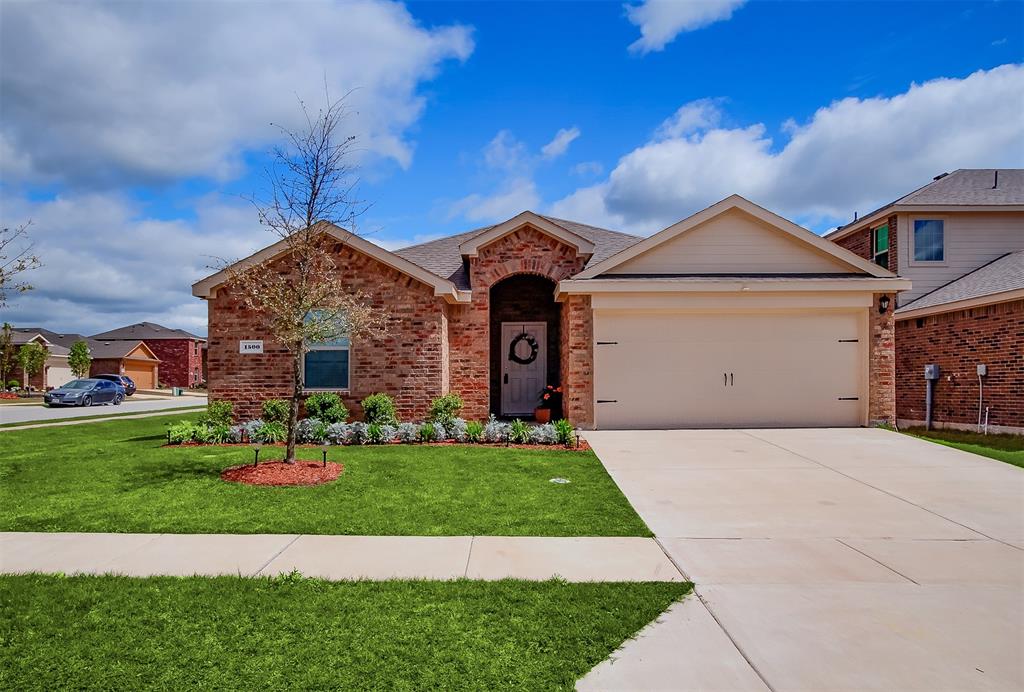 1500 Copper Street Princeton, TX 75407 - Photo 1 of 1 a front view of a house with a yard and garage