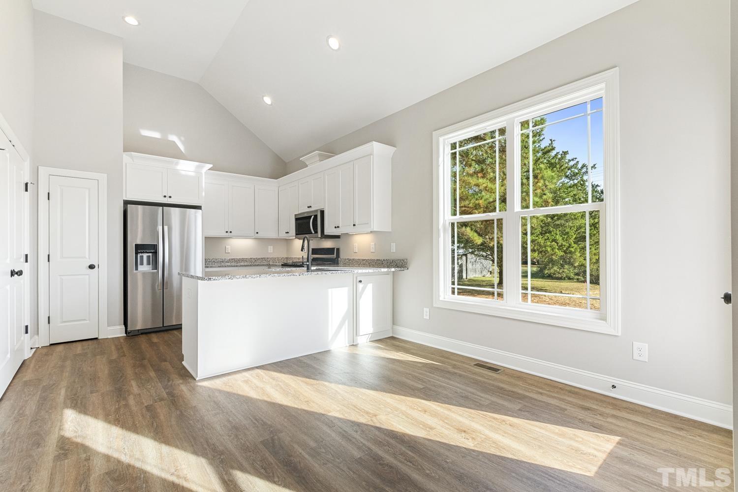 1004 Butler Drive Erwin, NC 28339 - Photo 12 of 38 a view of kitchen with wooden floor