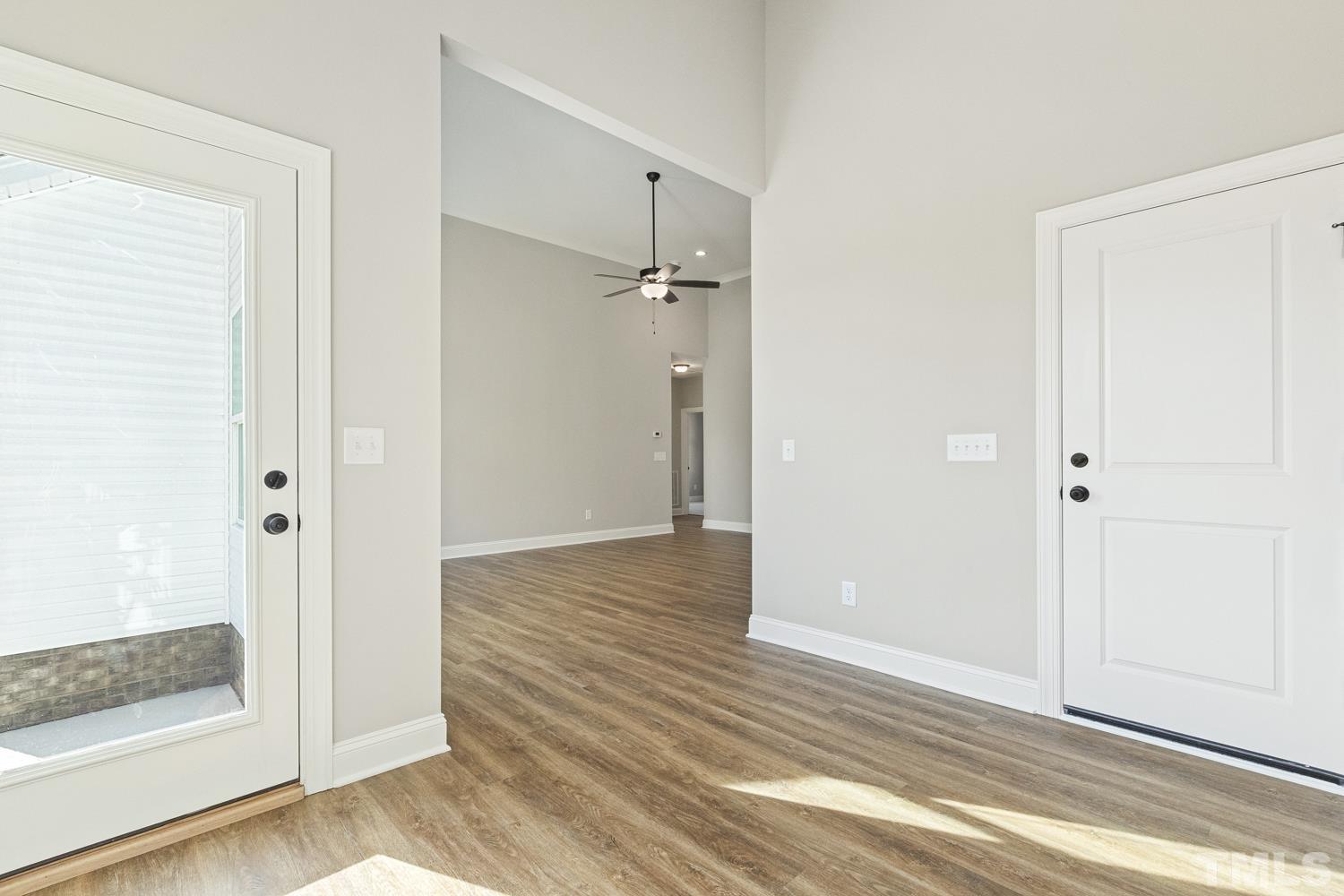 1004 Butler Drive Erwin, NC 28339 - Photo 14 of 38 a view of a hallway with wooden floor