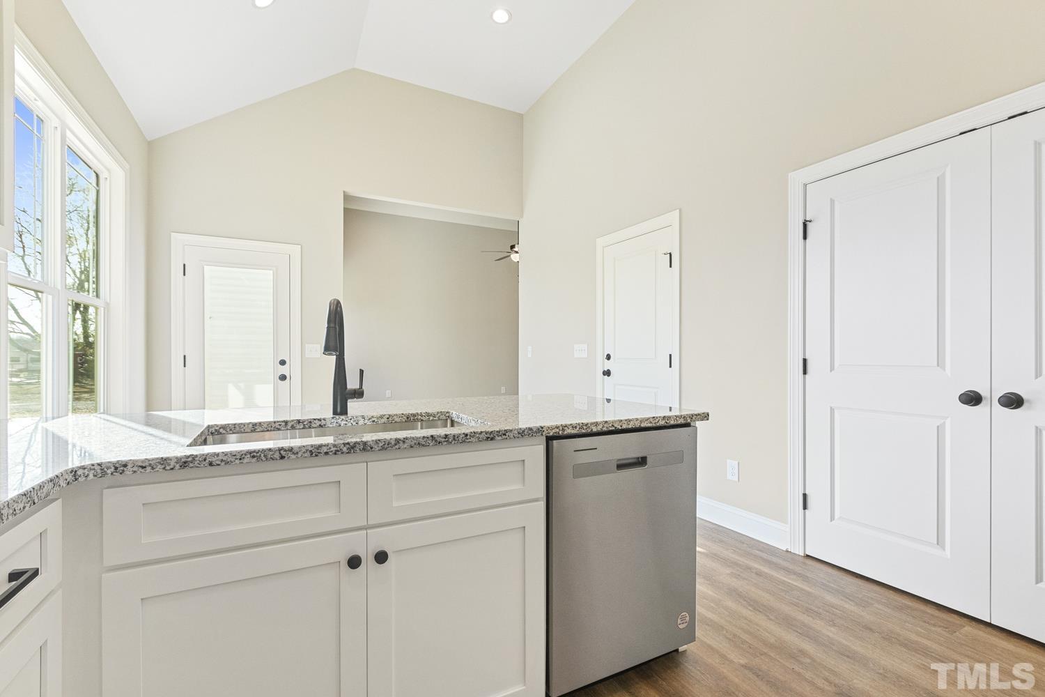1004 Butler Drive Erwin, NC 28339 - Photo 20 of 38 a bathroom with a granite countertop sink and a mirror