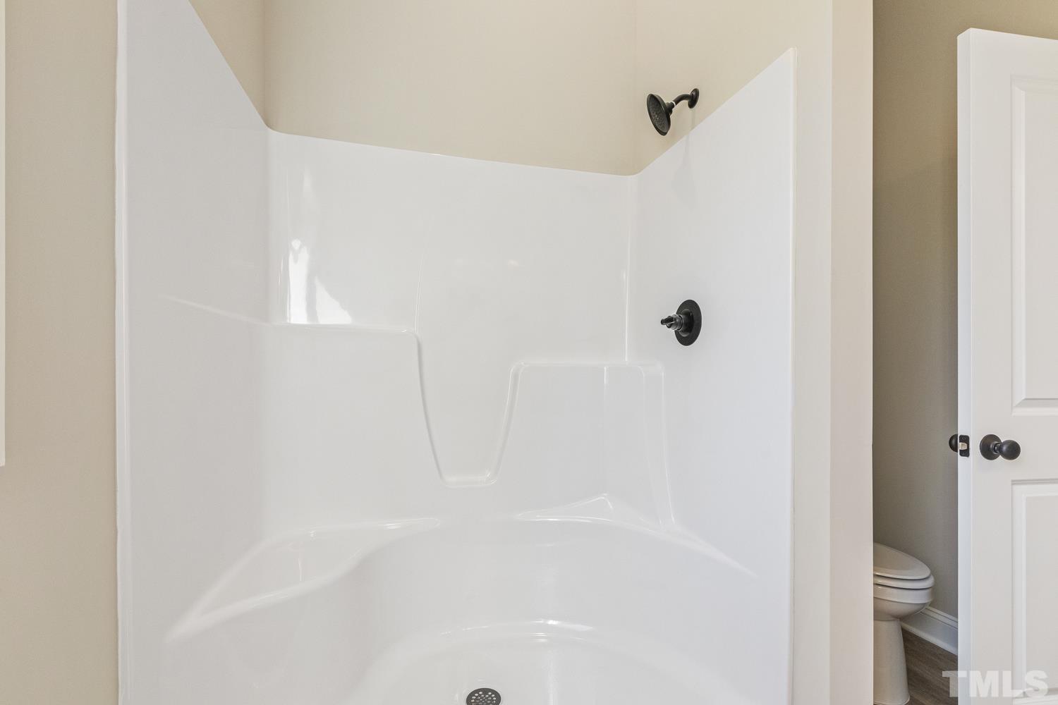 1004 Butler Drive Erwin, NC 28339 - Photo 30 of 38 a close up of a bathtub