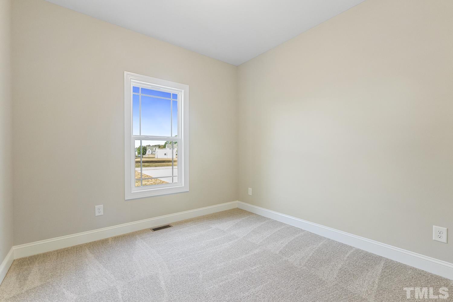 1004 Butler Drive Erwin, NC 28339 - Photo 32 of 38 an empty room with a window
