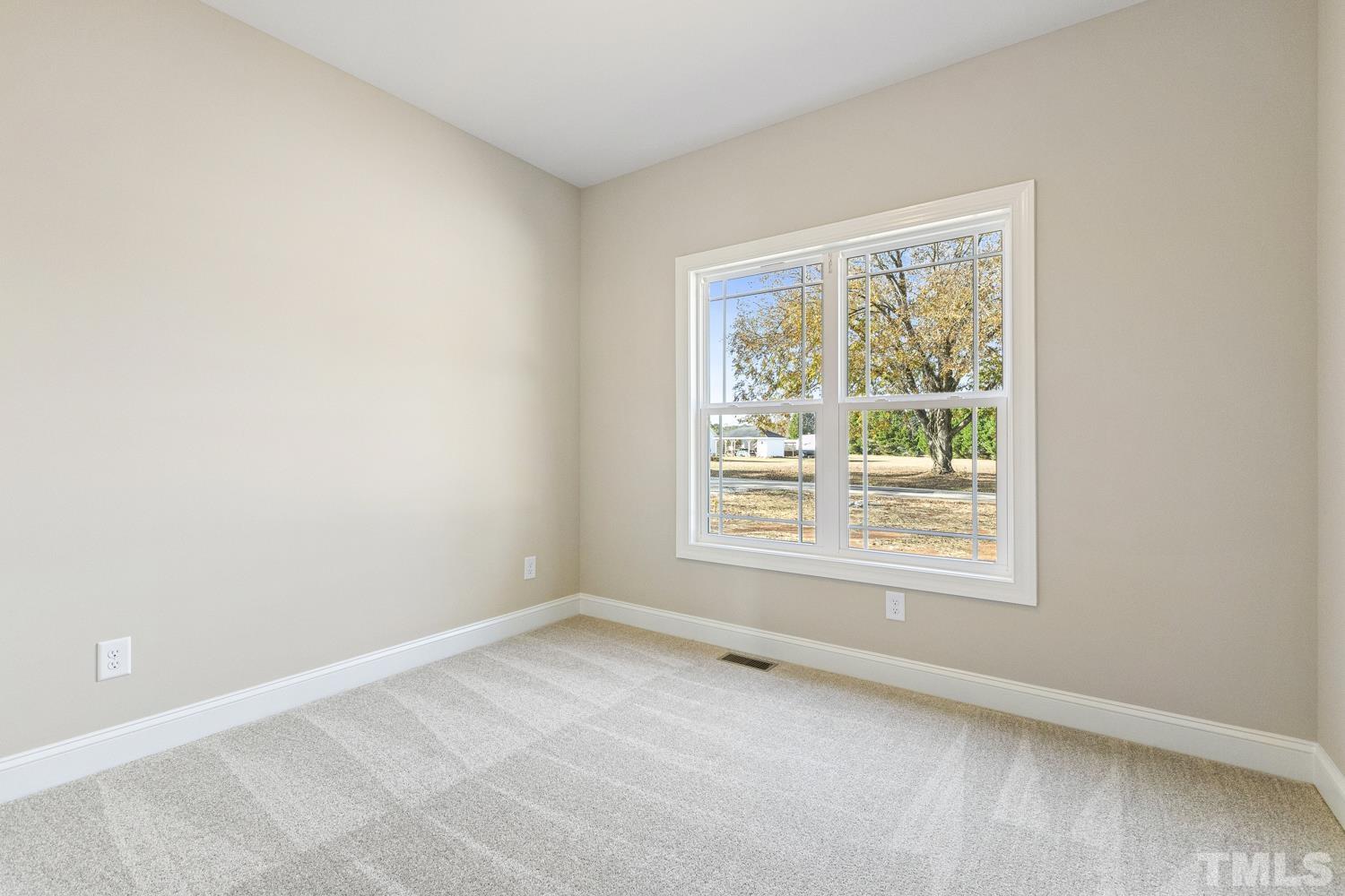 1004 Butler Drive Erwin, NC 28339 - Photo 35 of 38 an empty room with a window